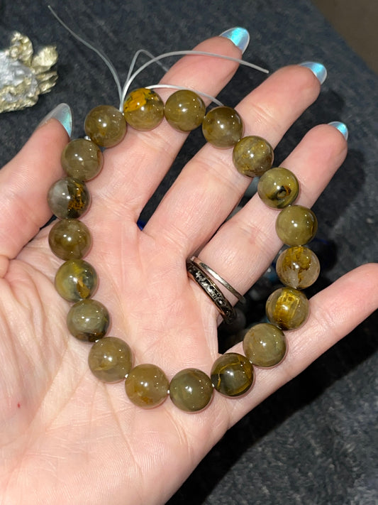 Golden Bracelet 11mm (unknown crystal mineral)